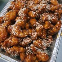 Sesame Chicken · Served with White Rice
