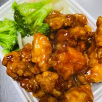 Dragon and Phoenix · Spicy. General Tso's Chicken and Shrimp with Mixed Vegetables in a white sauce.
