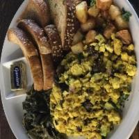 Tofu Scramble · Seasoned tofu, onion, mushrooms and bell peppers, served with roasted potatoes and your choi...
