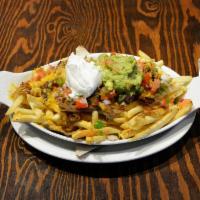 Carnitas Fries · 50/50 signature roast pork atop crispy golden fries, melted cheddar, house-made salsa and ch...