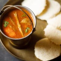 Idli sambar · Idlies are steamed rice cake made of fermented rice batter. It comes with sambhar and spicy ...