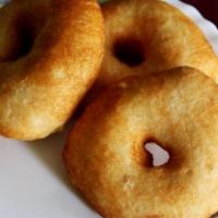 Medu Vada · South Indian fritter made with urad dal in donut shape crispy exterior outside and soft inte...