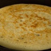 Plain Uttapam · Uttapam is a thick pancake, with toppings cooked right into the batter. Uttapam is sometimes...