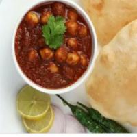 Poori Chole · Fried puffy bread with chickpeas 