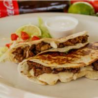 Pirata's · Flour tortilla stuffed with melted mozzarella cheese and your choice of meat.