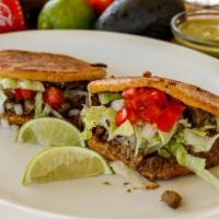 Gorditas · Gordita stuffed with cheese, beans, lettuce and tomato with your choice of meat.