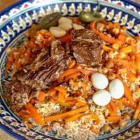 8. Traditional Plov · A staple in central Asian cuisine. Rice cooked with spices, having added meat and vegetable.