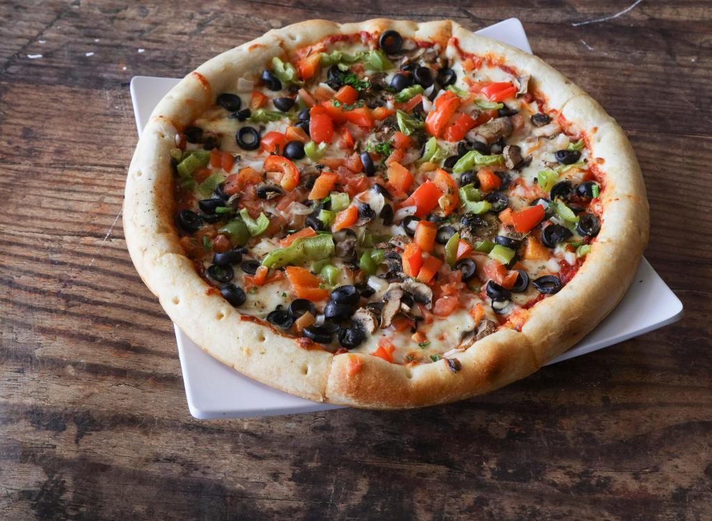 Chubby's Veggie Pizza · Olive oil, Classico sauce, mozzarella, green peppers, black olives, mushrooms, onions and tomatoes.