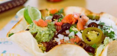 Taco Salad · Meat, beans, cheese, pico de gallo and lettuce, served in a baked tortilla shell.