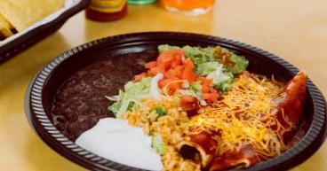 Enchilada - Taco Platter · Served with rice and beans.