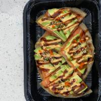 Salmon Pizza · Crispy pancake top with sliced Salmon . Avocado sesame seeds, spicy mayo ,eel sauce and masa...