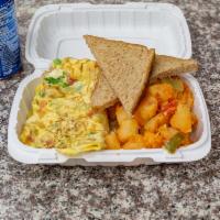 Veggie Omelette · Onion, pepper, broccoli, spinach, tomato, and cheese.