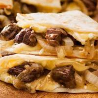 2. Steak Quesadilla · Grilled prime roast beef with cheddar and Jack cheese.