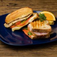 Canadian Bacon and Chicken Panini · Seasoned chicken on Italian bread pressed with sweet pineapple rings, crisp red bell pepper,...