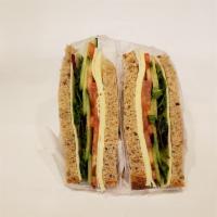 E. Delight Garden Sandwiches · Fresh mozzarella cheese, plum tomato, basil, sun-dried tomato, cucumber, olive oil on 7 grai...