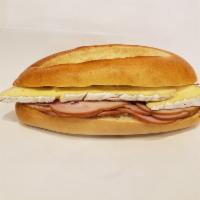 Special Sandwich #5 · Black forest ham, brie cheese, honey mustard on french baguette.