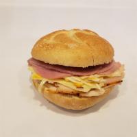 Special Sandwich #7  · Roast turkey, Virginia ham Swiss, coleslaw, Russian dressing on roll.