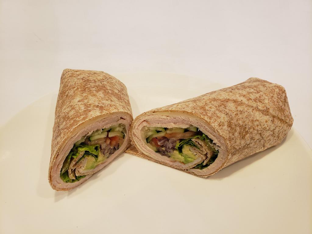 Turkey and Avocado Wrap · Turkey and avocado wrap roast turkey, alpine lace Swiss, avocado, carrots, cucumber, red onion, mix greens, tomato and ranch dressing on wheat wrap.