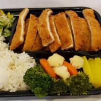 Chicken Katsu Bento · Chicken cutlet served with rice and vegetables.