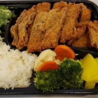 Tonkatsu Bento · Pork cutlet served with rice and vegetables.