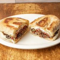 Mexicana Torta · Grilled steak, melted cheese, and Mexican sausage. traditional Mexican sandwich, served on a...