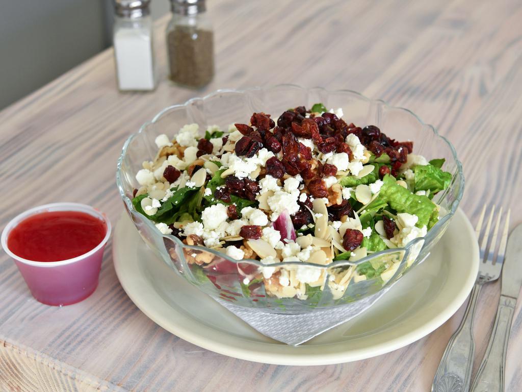 Cranberry Nut Salad available all day · Mixed greens, dried cranberries, almonds, walnuts and goat cheese and raspberry vinaigrette.