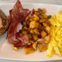 4 Points Breakfast · 2 farm-fresh eggs, any style, bacon, or turkey sausage, morning hash. Toast or seasonal frui...
