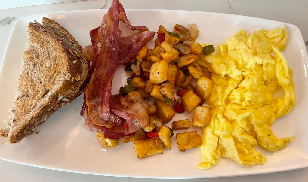 4 Points Breakfast · 2 farm-fresh eggs, any style, bacon, or turkey sausage, morning hash. Toast or seasonal fruit. Coffee or tea, choice of juice.