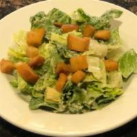 Caesar Salad · Romaine lettuce, croutons, Parmesan cheese, and Caesar dressing.