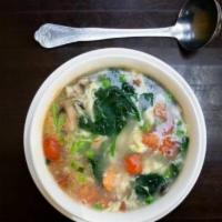 Dragons in The Garden Soup · 32 oz. shrimp, diced tomato, mushroom, spinach, and house broth finished with whipped eggs.