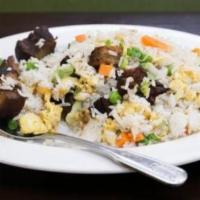 Pork Belly Fried Rice · Braised pork belly, jalapeno, peas, carrots, shredded lettuce, and egg.