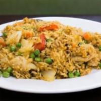 Curry Chicken Fried Rice · Chicken breast, red bell peppers, white onion, peas, carrots, egg, and house-blend curry spi...
