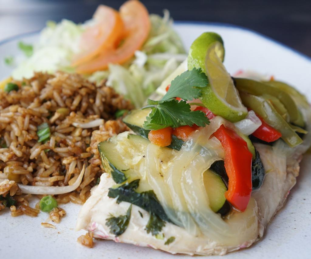 Red Snapper Fillet · Red snapper fillet, choose your style of cooking, and two sides.