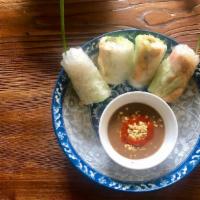 Fresh Summer Rolls · Served with lemongrass tofu lettuce, cucumber, herbs, bean sprouts and vermicelli, served wi...