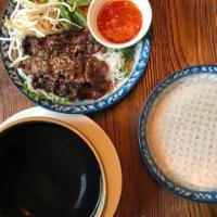 Grilled Lemongrass Beef · Served with lettuce, sprouts, fresh herbs, rice vermicelli and rice paper to wrap.