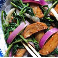 Crispy Seitan & Water Spinach · Sauteed with water spinach, onions and Asian basil. Vegetarian.