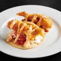 Tacos de Pescado · Tempura crimson snapper, avocado sauce, cole slaw, chipotle aioli, sour cream. Contains glut...