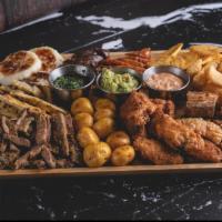 Platter for Two · Grilled steak, grilled chicken breast, blood sausage, Colombian sausage, buffalo wings, frie...
