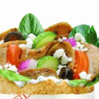 Gyro · Our Classic Gyro comes with Gyro meat, Spinach, Cucumbers, Tomatoes, Black Olives, Onions, F...