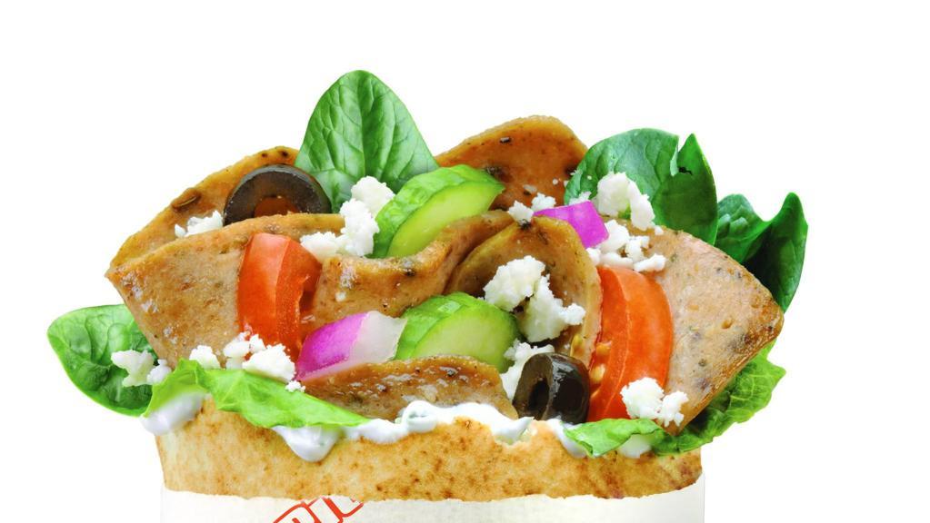 Gyro · Our Classic Gyro comes with Gyro meat, Spinach, Cucumbers, Tomatoes, Black Olives, Onions, Feta Cheese, and Tzatziki Sauce!
