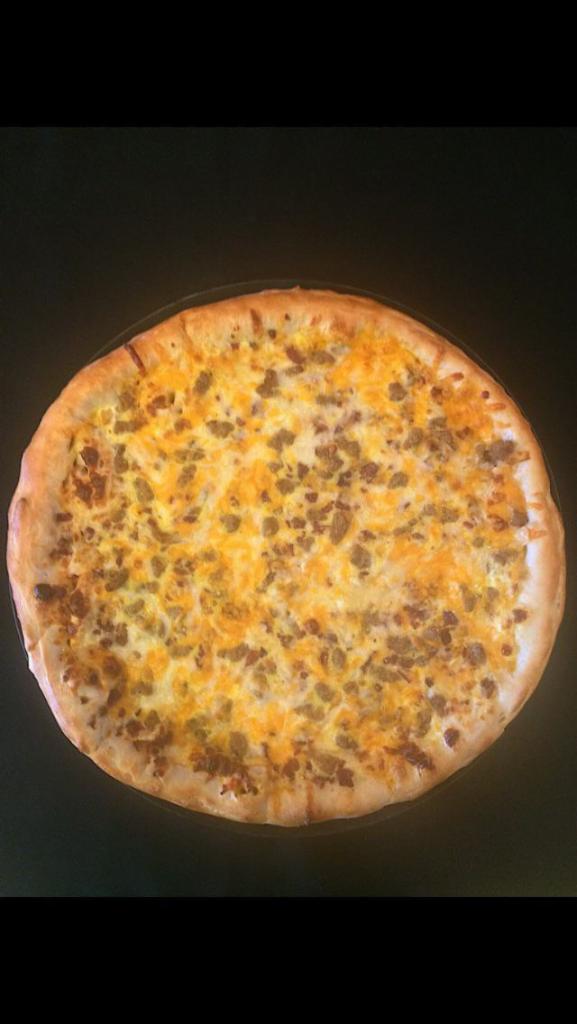 Ham, Bacon, Egg and Cheese Breakfast Pizza · Ham, sweet green peppers, onions, egg, bacon, sausage and cheese.