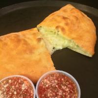 3 Cheese Calzones · A blend of mozzarella, ricotta and Parmesan cheese.
