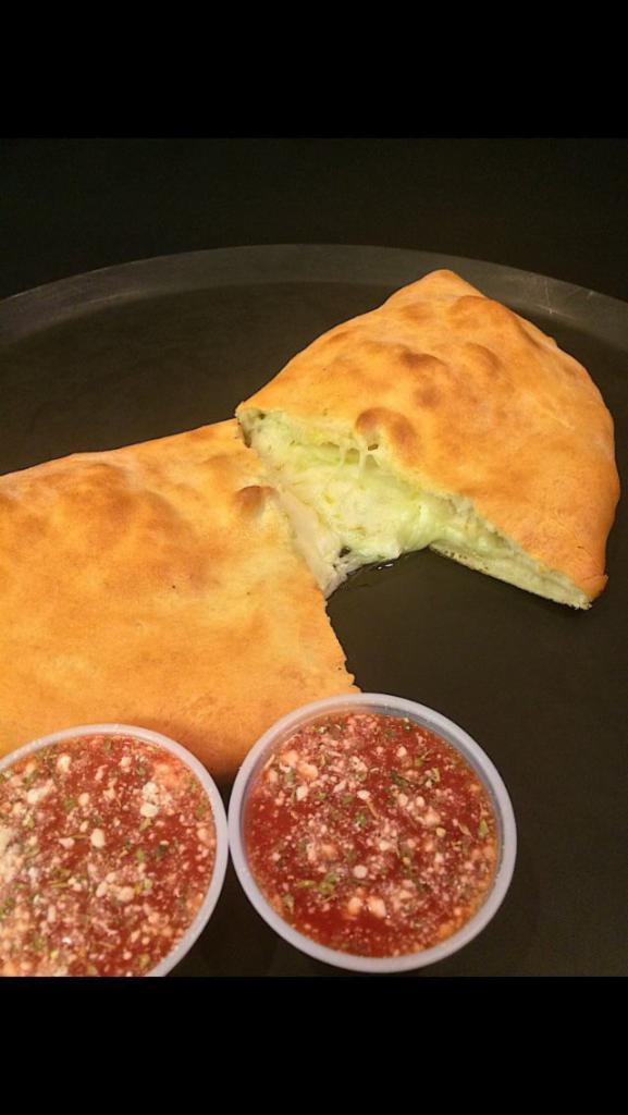 3 Cheese Calzones · A blend of mozzarella, ricotta and Parmesan cheese.
