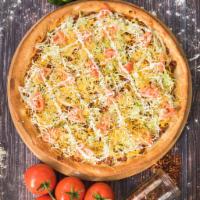 Taco Pizza · Pizza cheese, cheddar cheese, side sour cream, side salsa, ground beef, lettuce, tomatoes an...