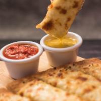 Cheese Garlic Sticks · Mozzarella cheese and garlic sauce.