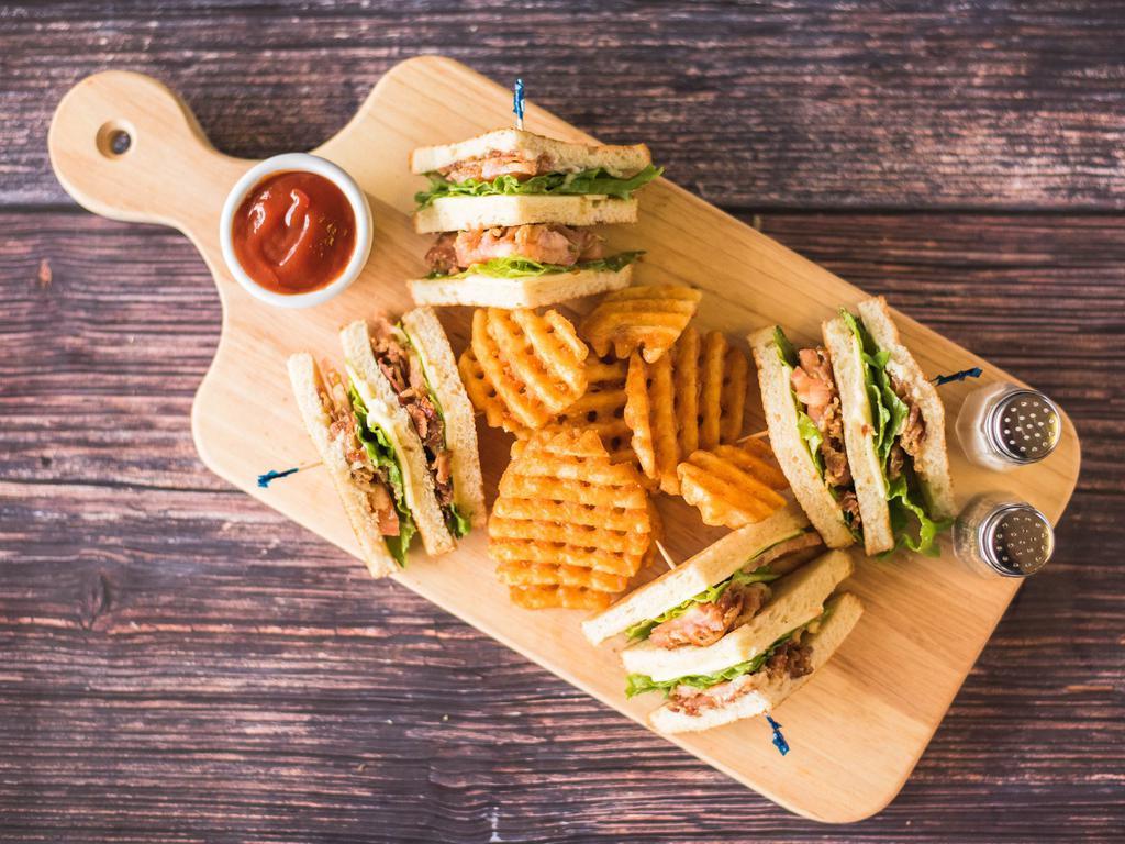 BLT Club Sandwich · Waffle fries, white bread, lettuce, tomato, mayo, bacon and toasted.