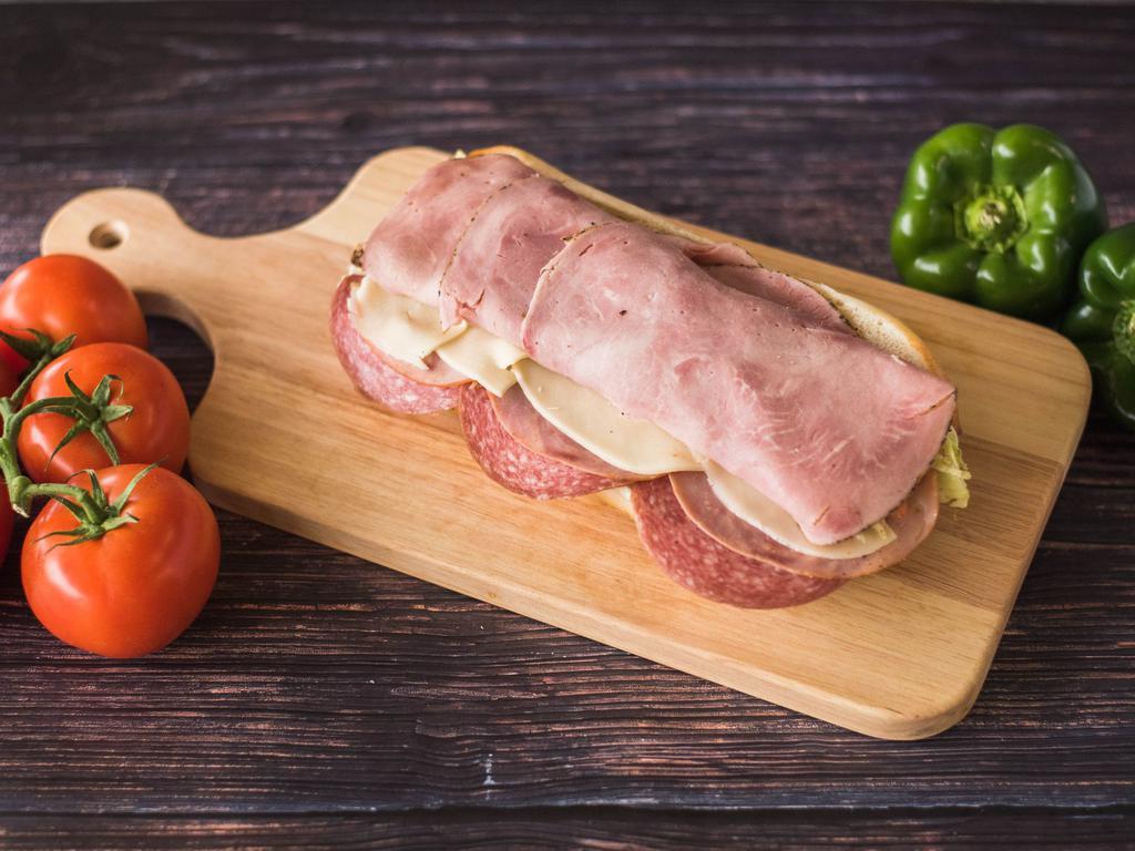 Italian Hoagie · Sub roll, provolone, lettuce, tomato, onions, salt, pepper, oregano, cappicola, Genoa, and pepper ham.