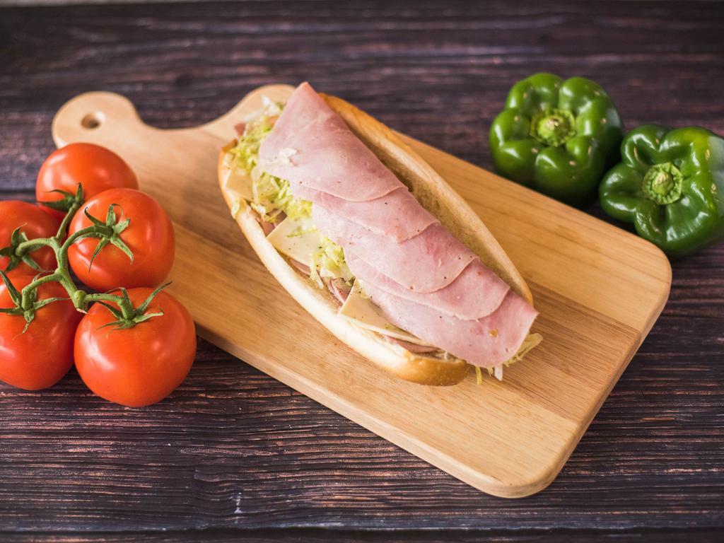 Ham Hoagie · Sub roll, American cheese, lettuce, tomato, onions, salt, pepper, oregano, and ham.