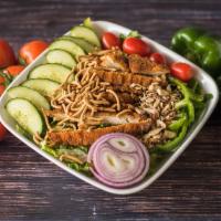 Thai Chicken Salad · Breaded chicken, lettuce, tomato, onions, peppers, cucumbers, croutons, noodles and almond f...