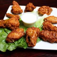 Chicken Wings · Plain, spicy or BBQ.